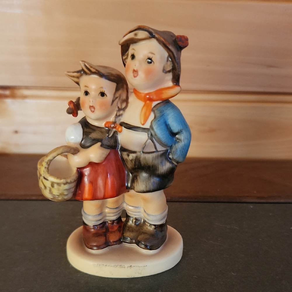 Final Price/ Goebel Figurine with Blue and Brown Accents